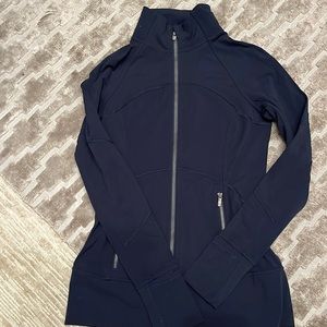 Lululemon navy “luon” fabric fitted zip jacket with zipper pockets.